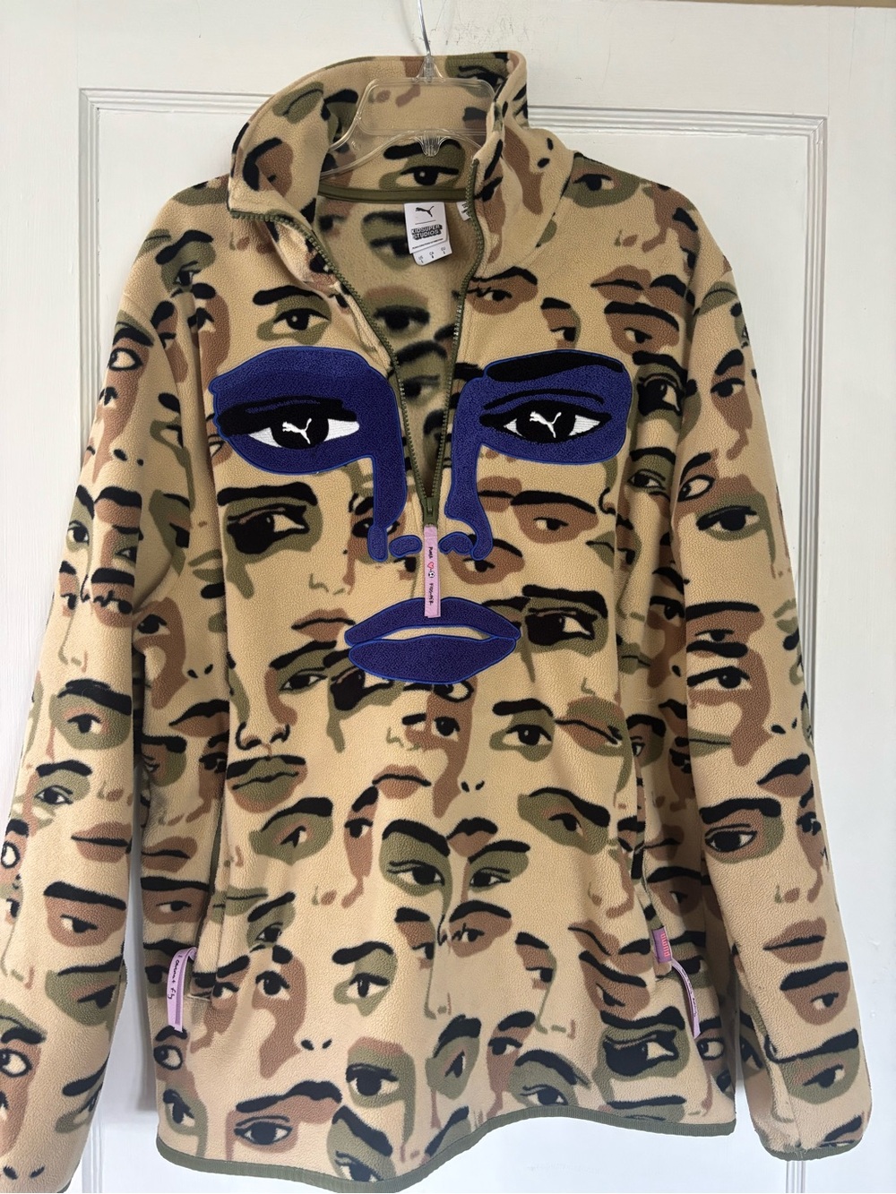 Puma Men’s Beige Multi-Face Print Quarter-Zip with Blue Appliqué